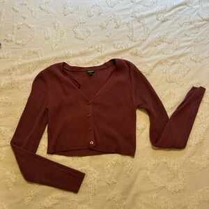 Waist height mauve cardigan